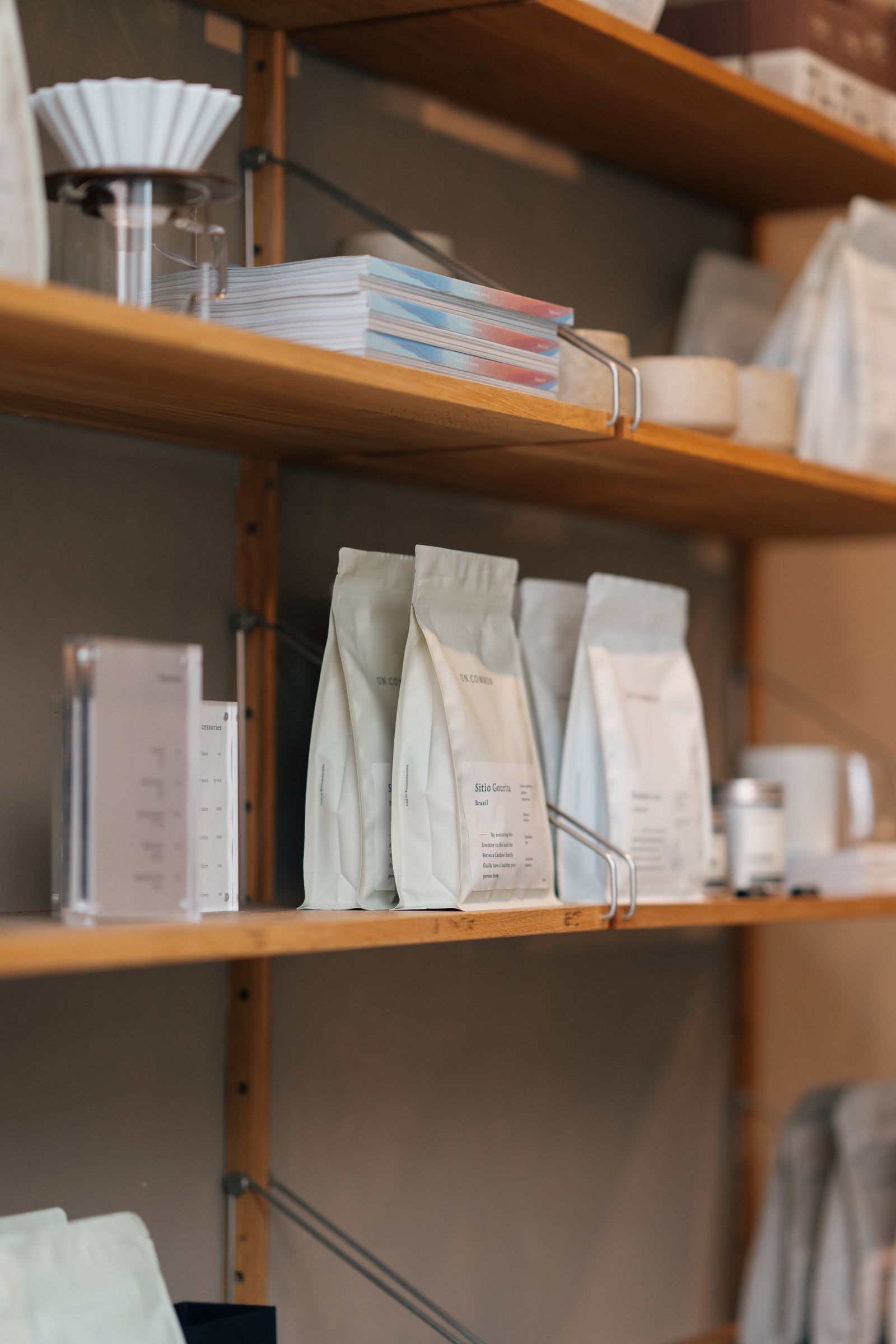 Neatly organized products on wooden store shelves
