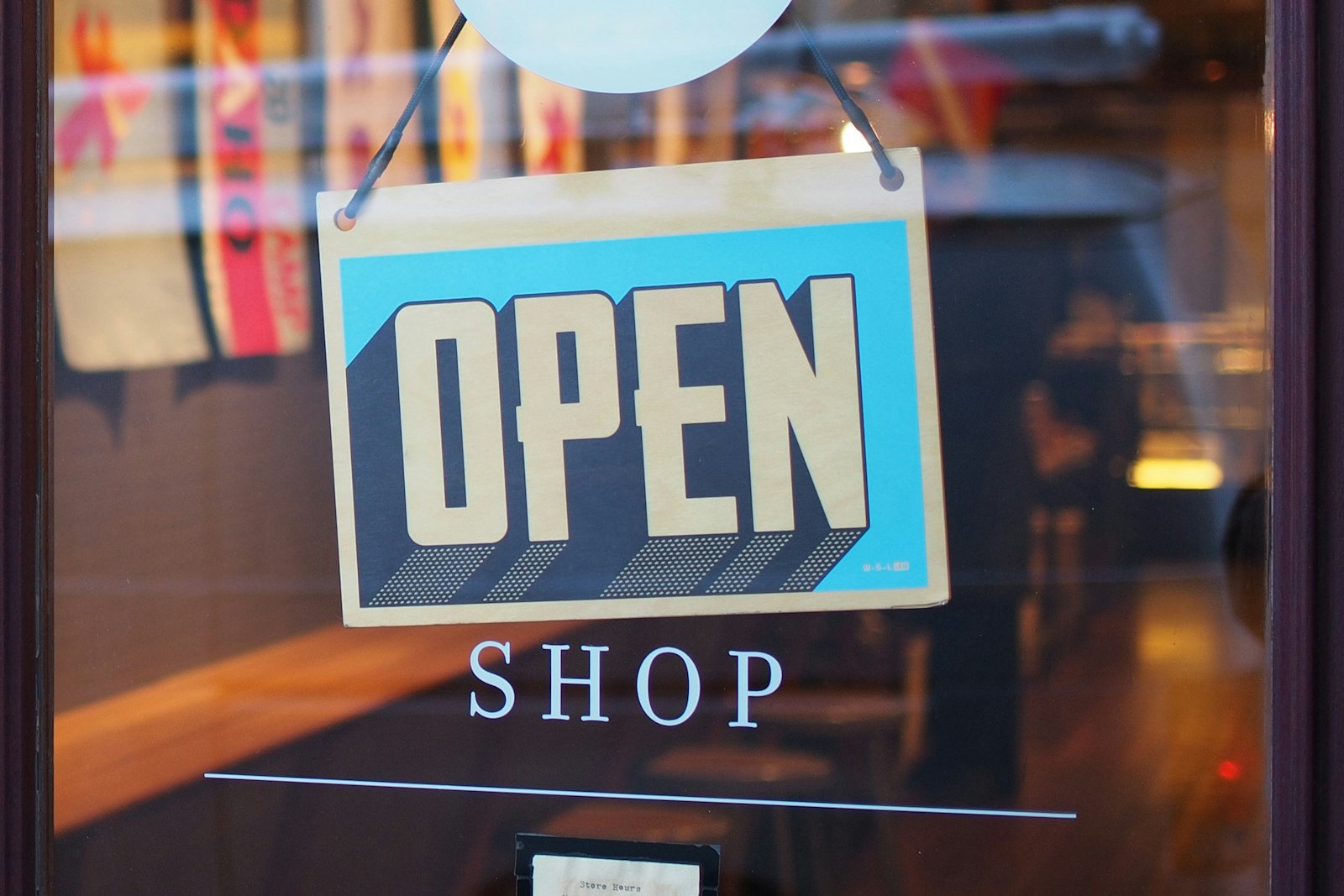 An open sign on a shop door