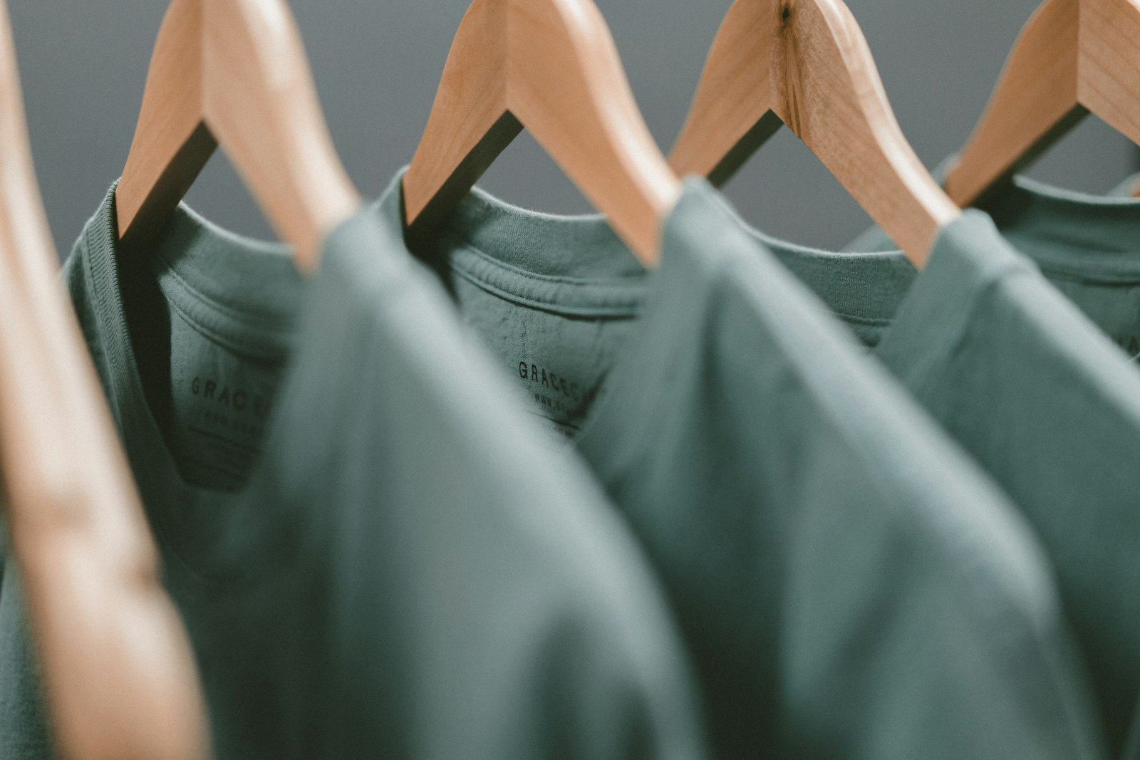 A rack of neatly hung shirts