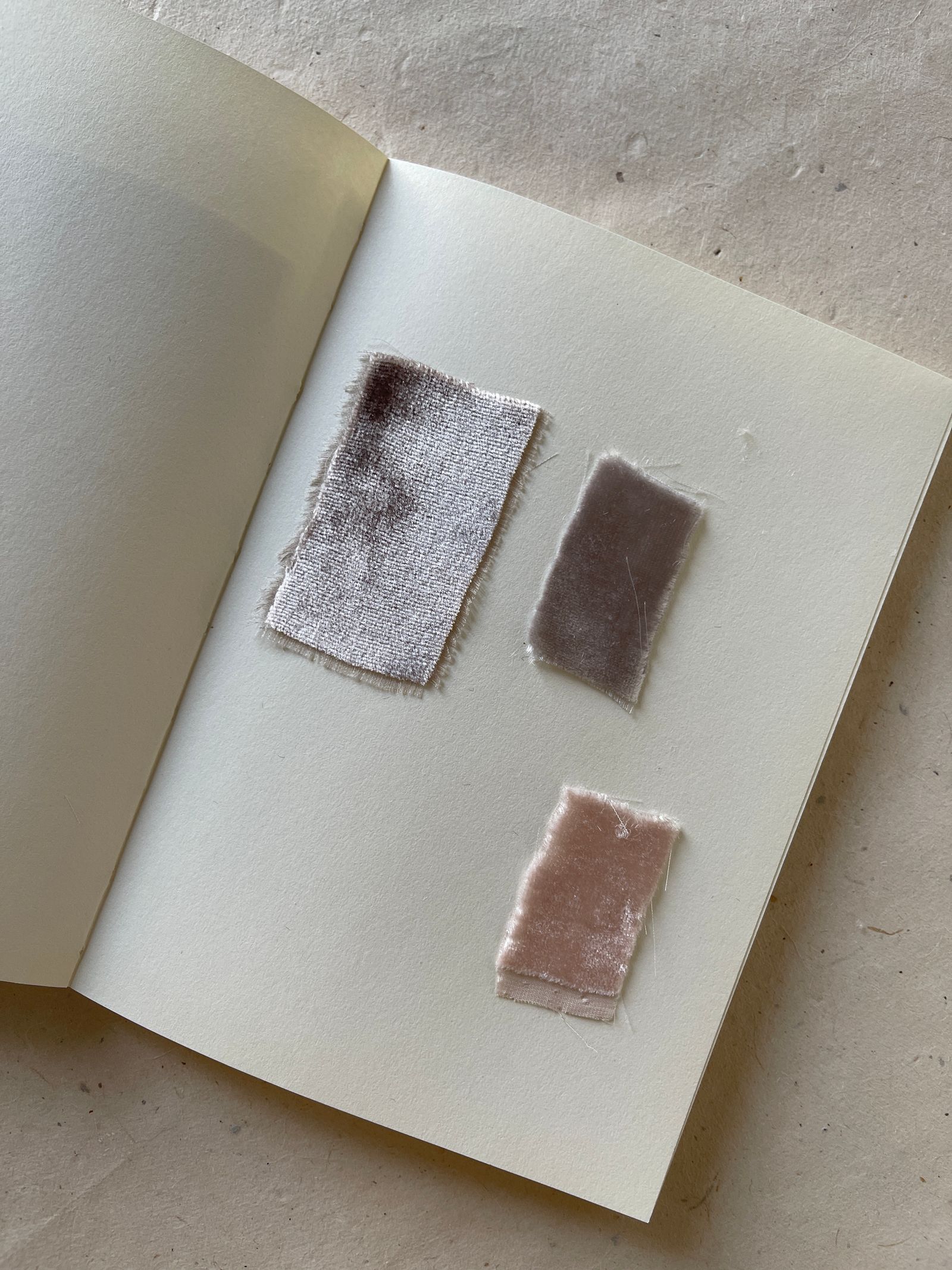 A notebook of velvet color swatches